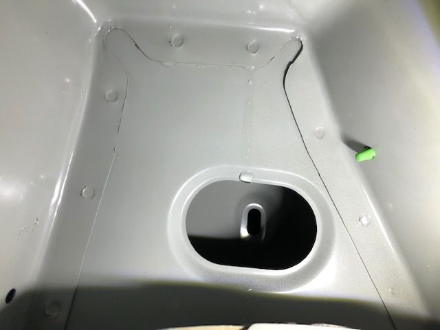 ns rear seatbelt mount water.jpg