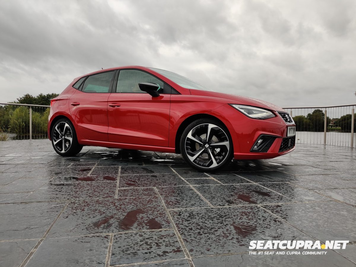 Red SEAT Ibiza FR Sport parked next to a lake