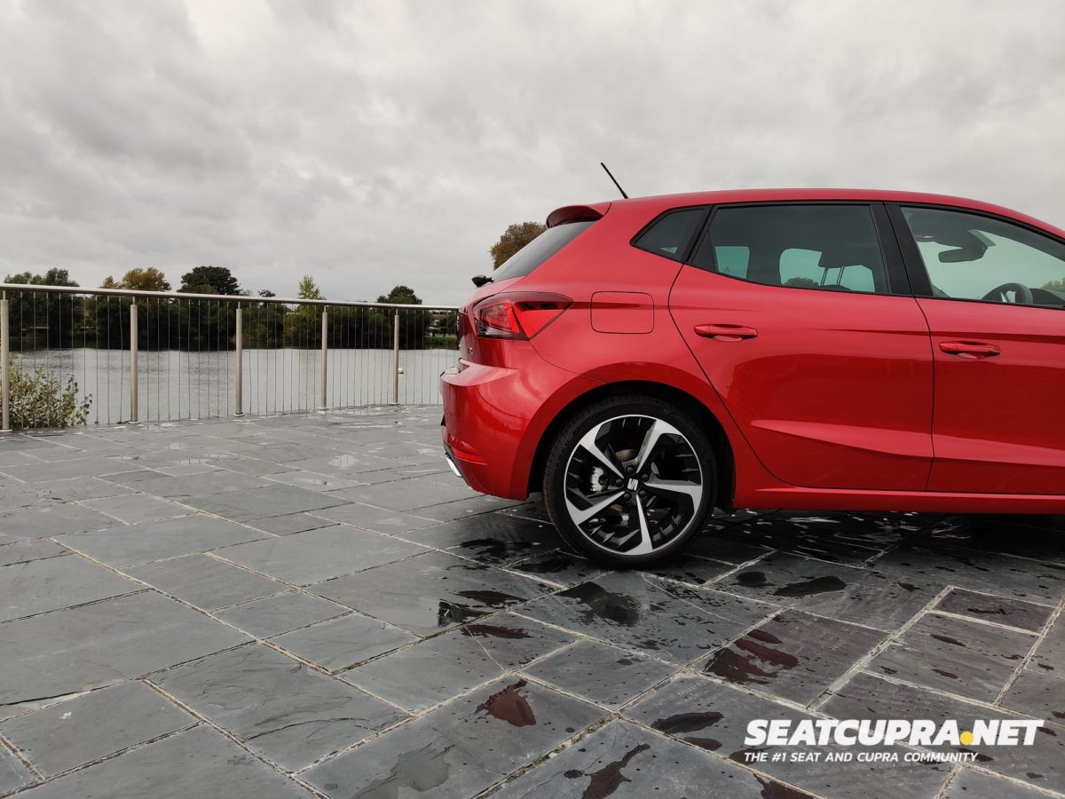 Red SEAT Ibiza FR Sport parked next to a lake