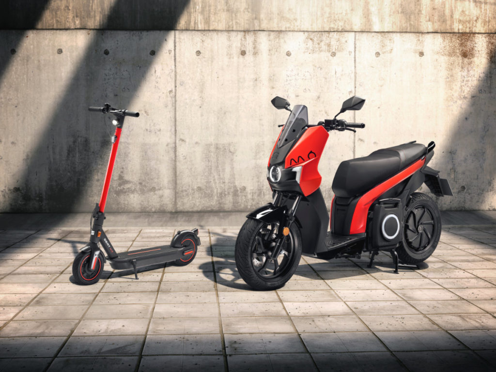 Two of the scooters in red